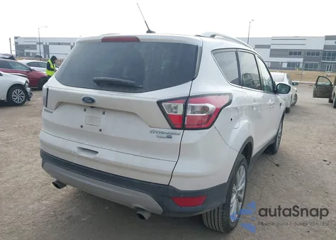 2017 Ford Escape Titanium z USA, uszkodzony, nr VIN 1FMCU9J96HUE25242